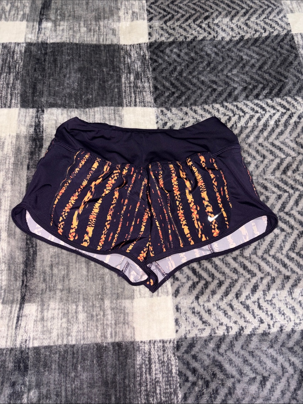 Nike Women’s Purple Athletic Shorts with Orange Print